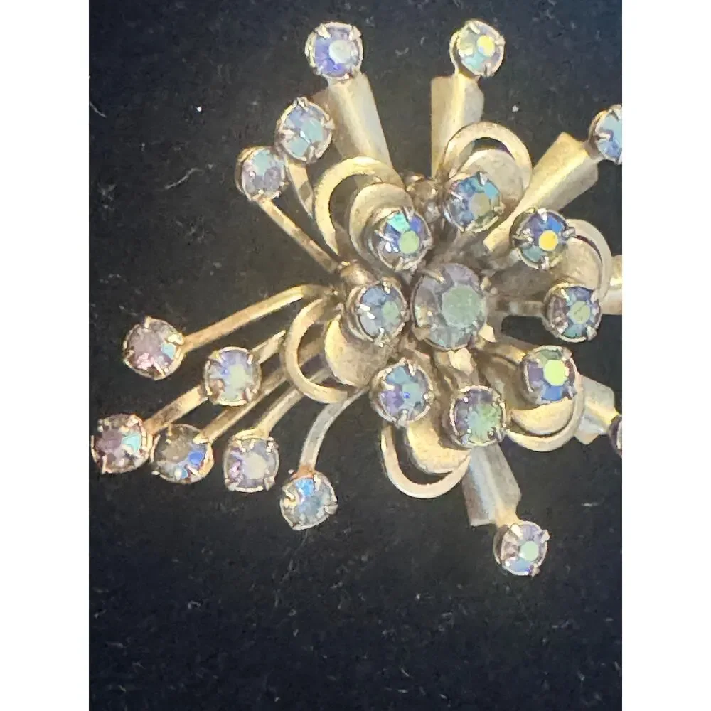 Vintage‎ MCM brooch, gold toned with light blue rhinestones